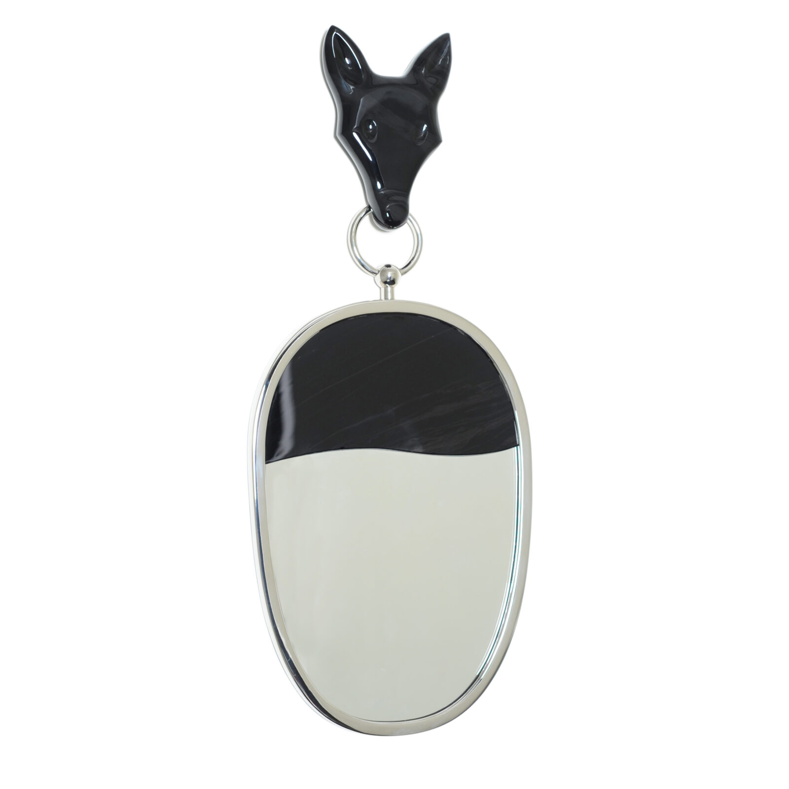 mirror hanging from his obsidian wolf head